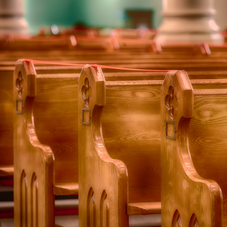 Ends of 3 Wooden pews with carved Cross symbol